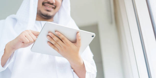 Small business owner reviewing legal requirements to start a business in Abu Dhabi